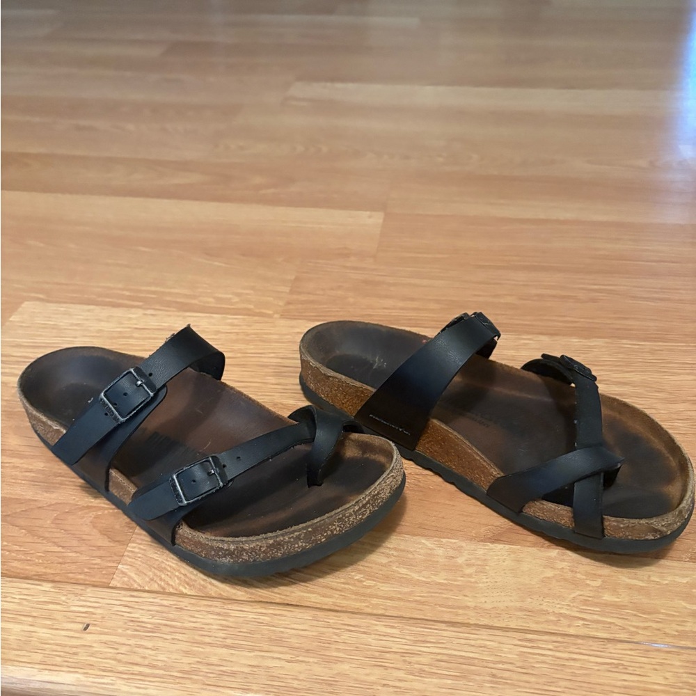 Birkenstock Black Sandals with Adjustable Straps and Contoured Footbed